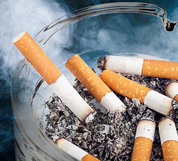 cigarette butts in ashtray